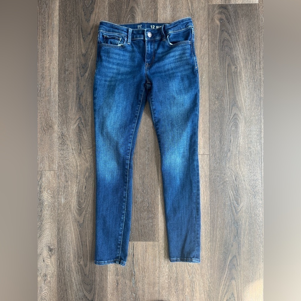 Gap kids super skinny jeans.  Dark wash jeans.  Girl’s size 12. Like new!